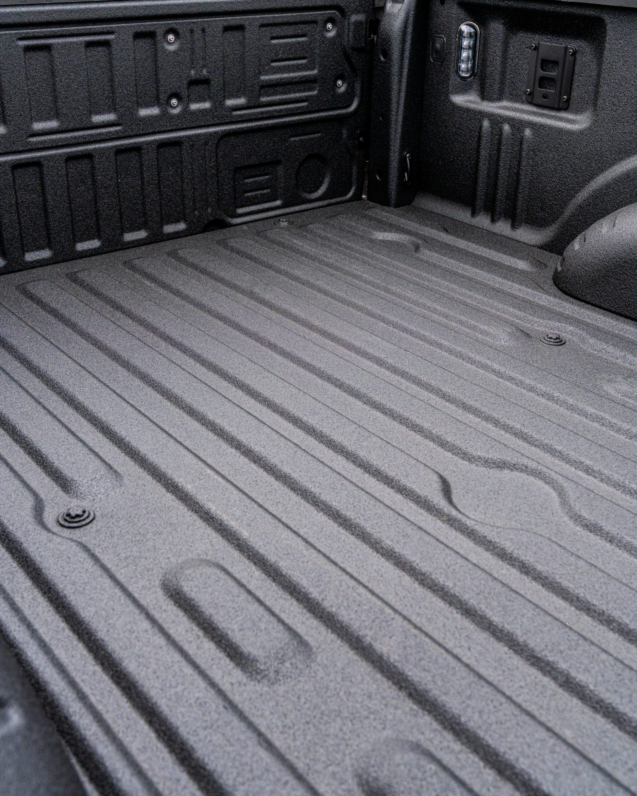 Spray-on bed liner applied to a truck bed by Patriot Liner